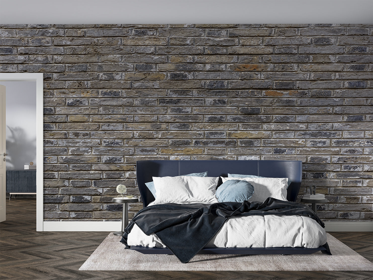 Industrial grey brick wallpaper in modern living room with leather sofa and metal accents