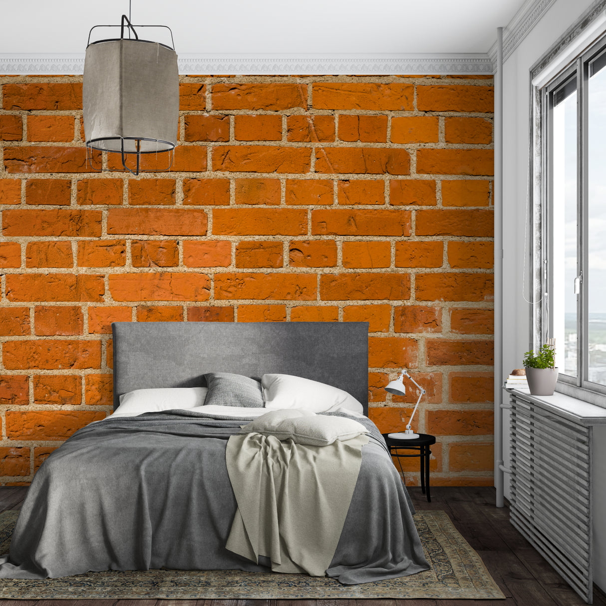 Orange brick wallpaper showcased in studio apartment with urban decor