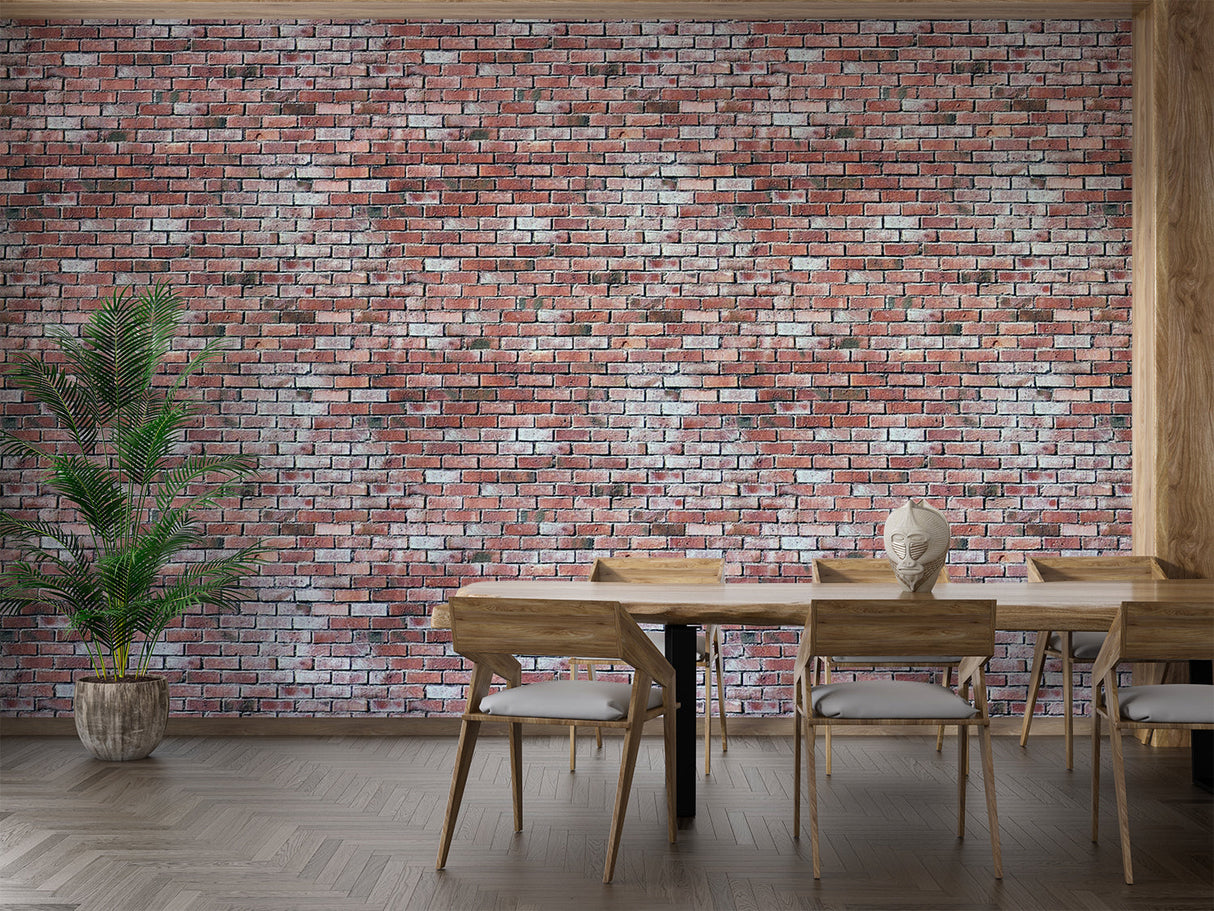 Red brick wallpaper mural creating an industrial accent wall in a modern living room with leather furniture