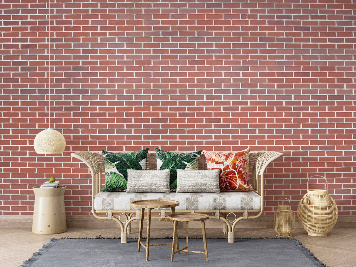Red brick wallpaper bringing industrial charm to a modern living room with leather furniture