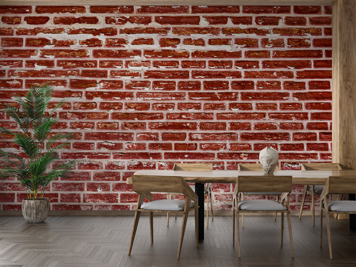 Industrial brick mural adding warmth to minimalist dining space with pendant lights