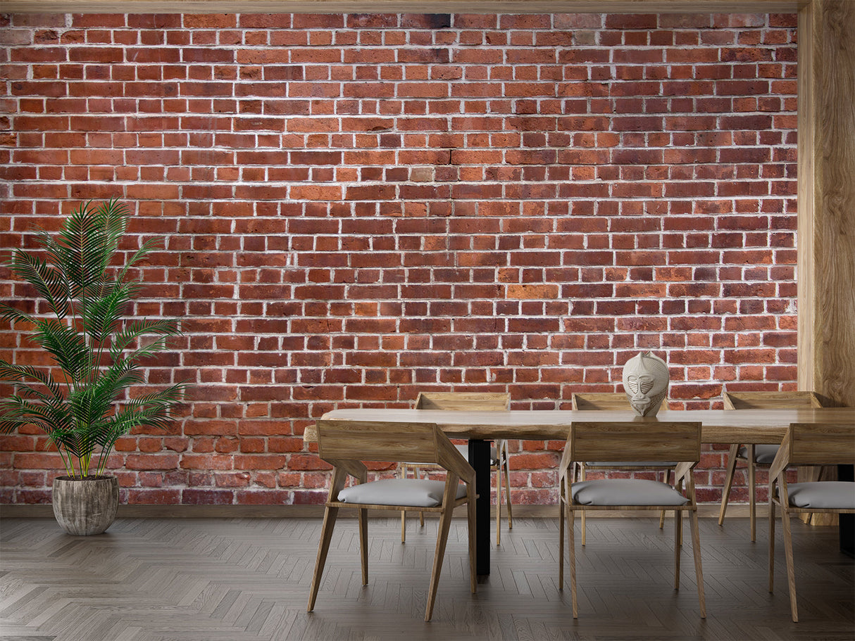 Red brick mural wallpaper showcased in a minimalist home office setting