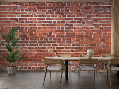 Red brick wallpaper mural styled in modern living room with grey sofa and industrial lighting