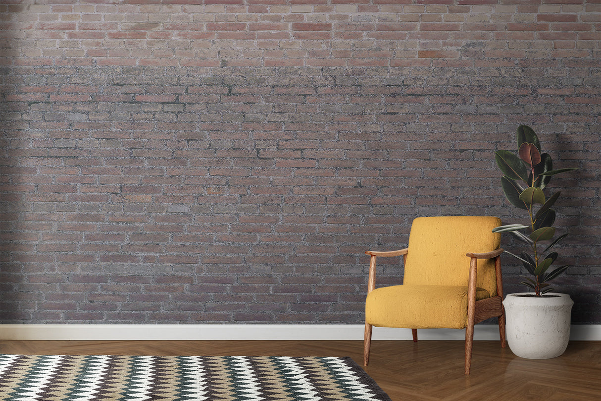 Brick effect feature wall creating urban loft style in a bedroom setting