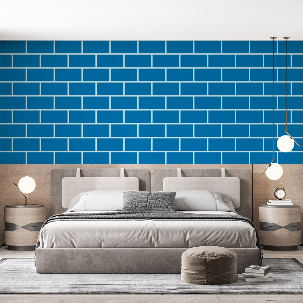 Modern blue brick pattern wallpaper in a bright contemporary living room, showing geometric design impact