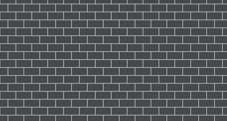 Modern grey brick wallpaper creating an industrial feel in a stylish living room with minimal furniture