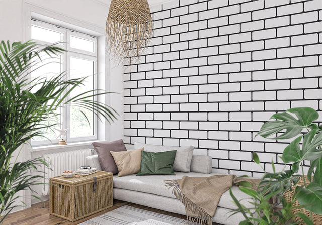 Modern black and white brick wallpaper in a bright contemporary living room with minimalist furniture