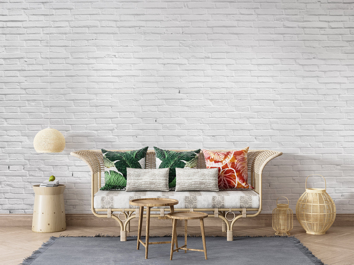 Industrial brick mural creating texture in a modern kitchen with stainless steel appliances