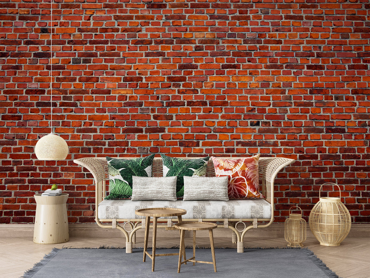 Rustic red brick wallpaper in a home office with vintage furniture and industrial lighting
