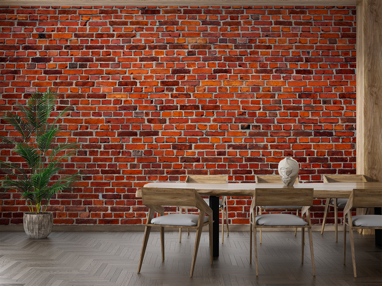 Brick wall mural adding character to a dining room with modern furnishings and pendant lights