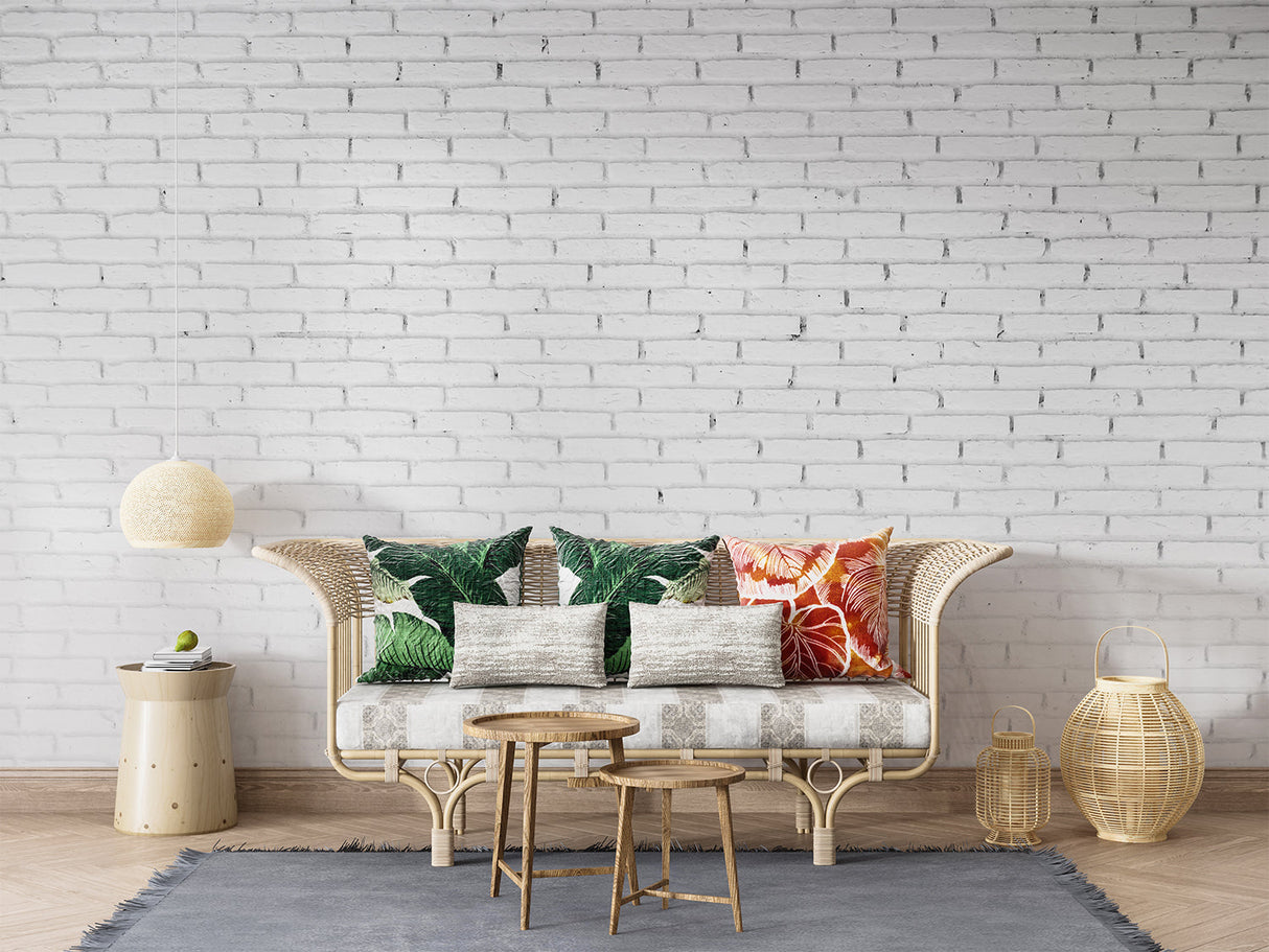 White brick wallpaper in modern living room with grey sofa and natural light