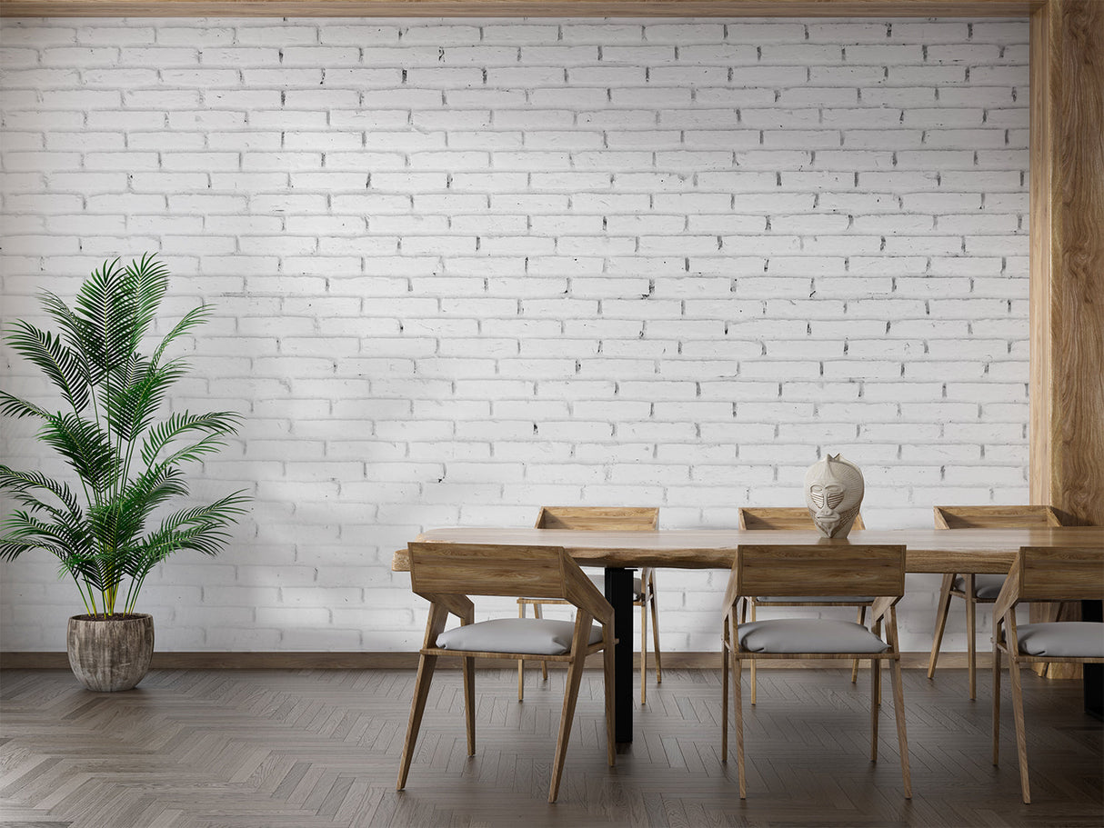 Industrial brick mural creating statement wall in minimalist kitchen