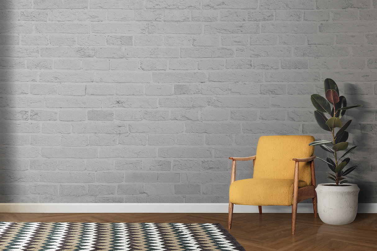 Modern white brick wallpaper in home office with wooden desk