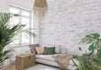 White brick wallpaper in modern living room creating an urban industrial feel