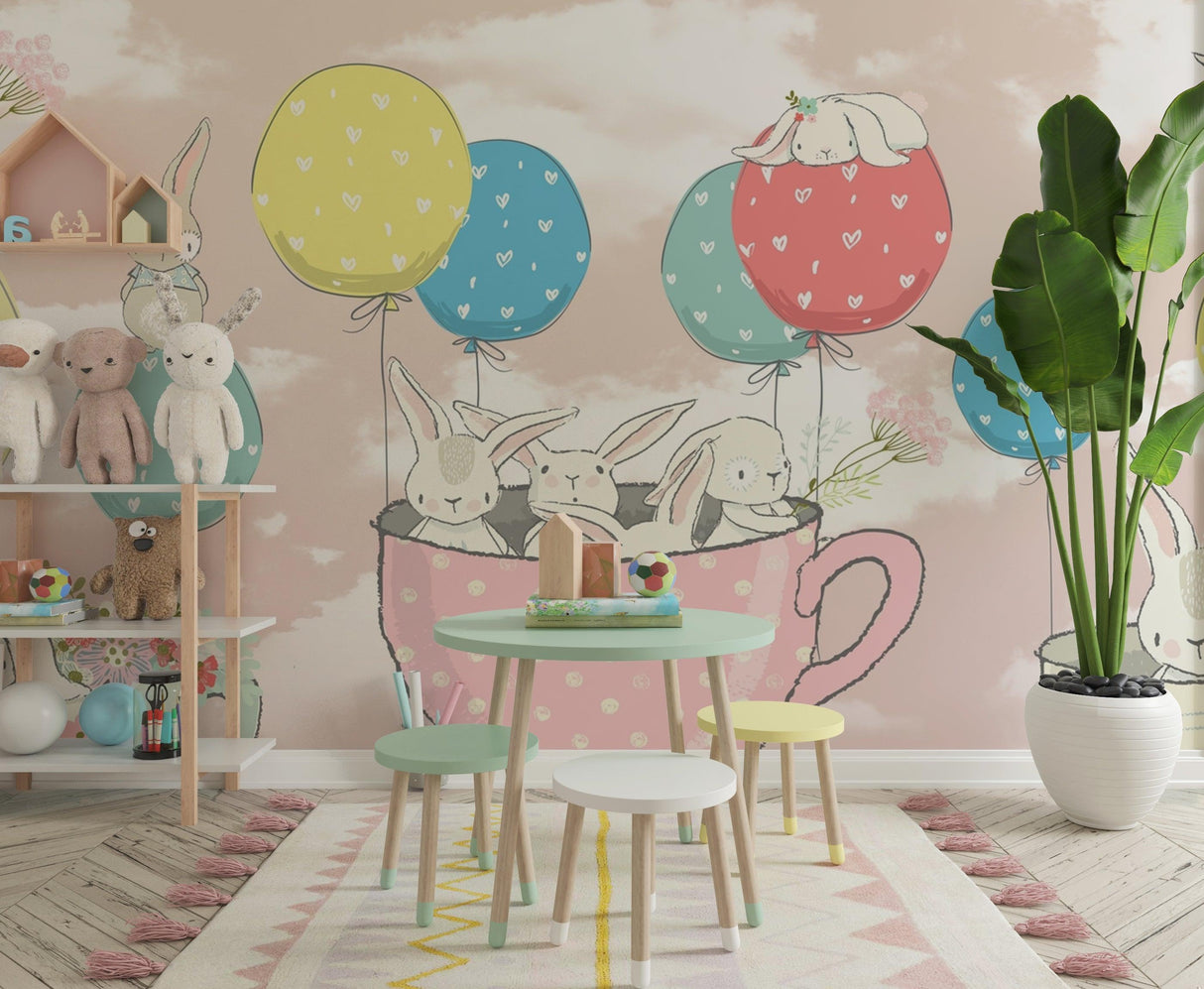 Teacup bunny wallpaper displayed in a cozy playroom with reading nook and toys