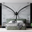 Black and white butterfly wall mural creating an elegant focal point in a bright, modern living room setting