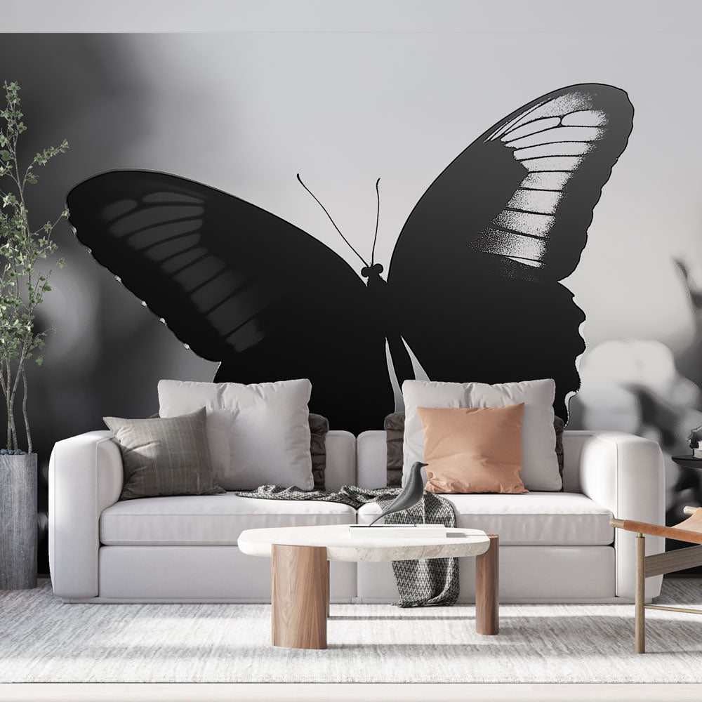 Black Butterfly Wall Mural creating dramatic impact in modern minimalist living room with white furniture