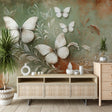 Butterfly wallpaper mural creating a serene atmosphere in a bright living room with sage green and terracotta accents