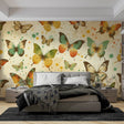 Butterfly wall mural in mint green and orange creating a fresh look in a bright modern living room with natural light