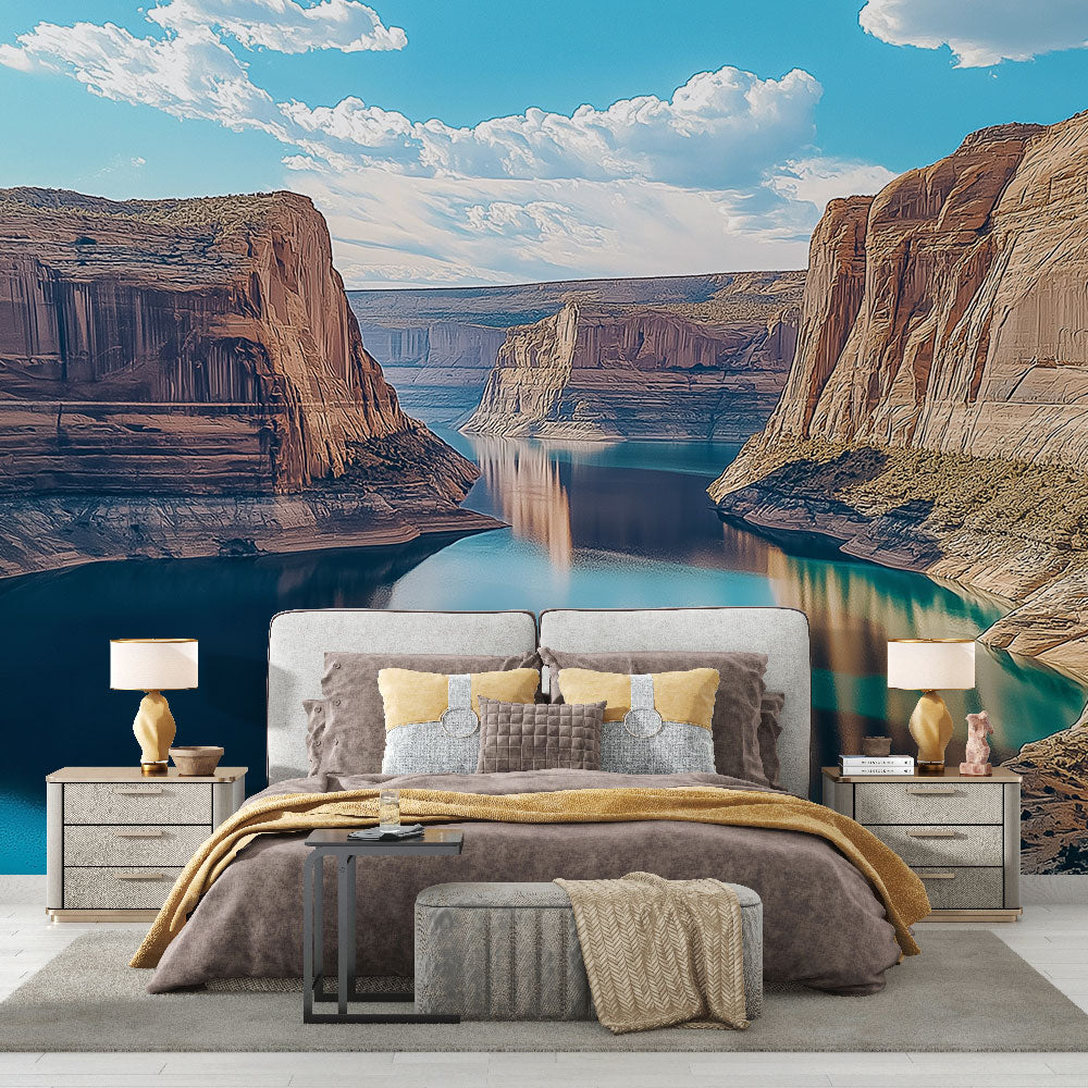 Canyon landscape wallpaper creating depth in a modern living room with natural light and minimal furniture
