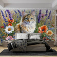 Cat mural wallpaper showcased in a bright living room setting, ginger cat among purple and orange flowers creating depth
