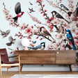 Cherry blossom wallpaper with birds creating a peaceful atmosphere in a bright modern bedroom with natural light