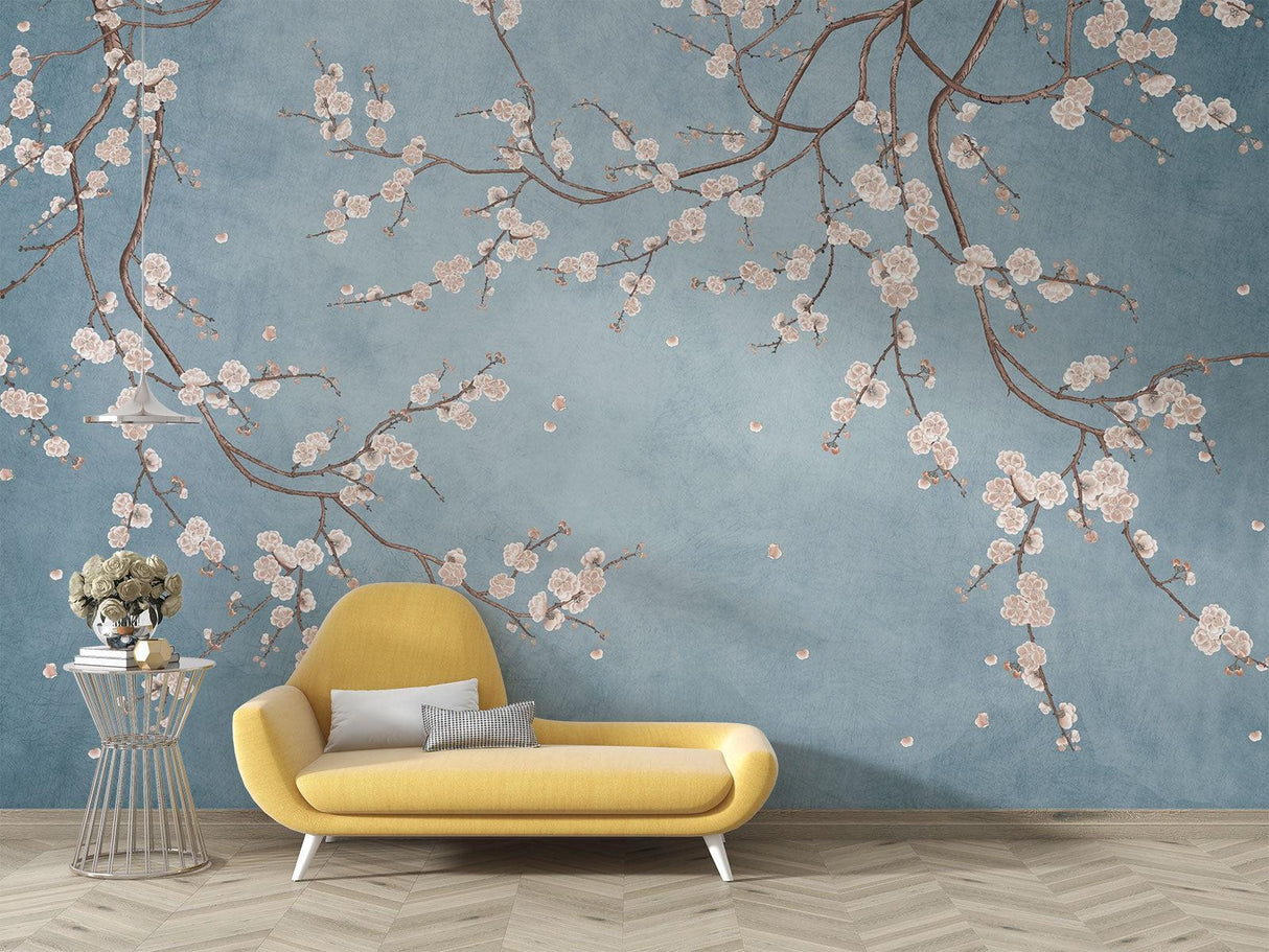 Japanese cherry blossom mural in a cozy bedroom setting with natural light