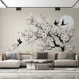 Cherry blossom wallpaper mural creating a serene atmosphere in a modern minimalist bedroom with soft lighting