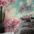 Cherry blossom wallpaper creating a serene atmosphere in a modern bedroom, pink sakura branches against turquoise sky