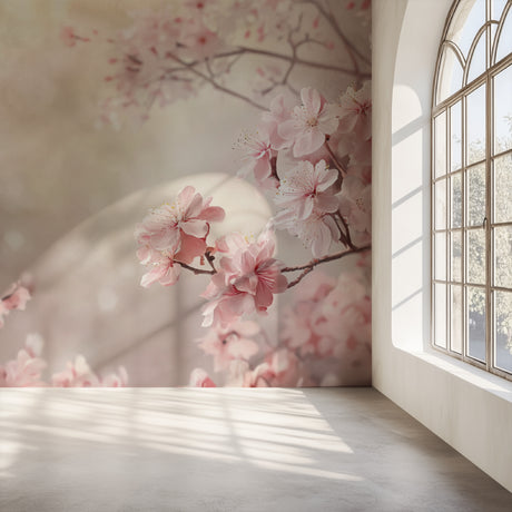 Cherry blossom wallpaper in bright modern bedroom showing soft pink petals against white walls