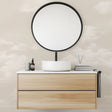 Cloud mural wallpaper creating a peaceful atmosphere in a modern bedroom with natural light and minimal furniture