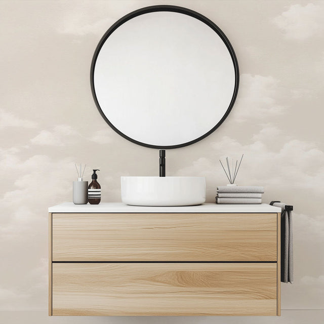 Cloud mural wallpaper creating a peaceful atmosphere in a modern bedroom with natural light and minimal furniture