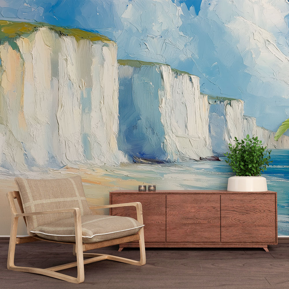 Coastal landscape wallpaper creating a bright, airy atmosphere in modern living room with white furniture