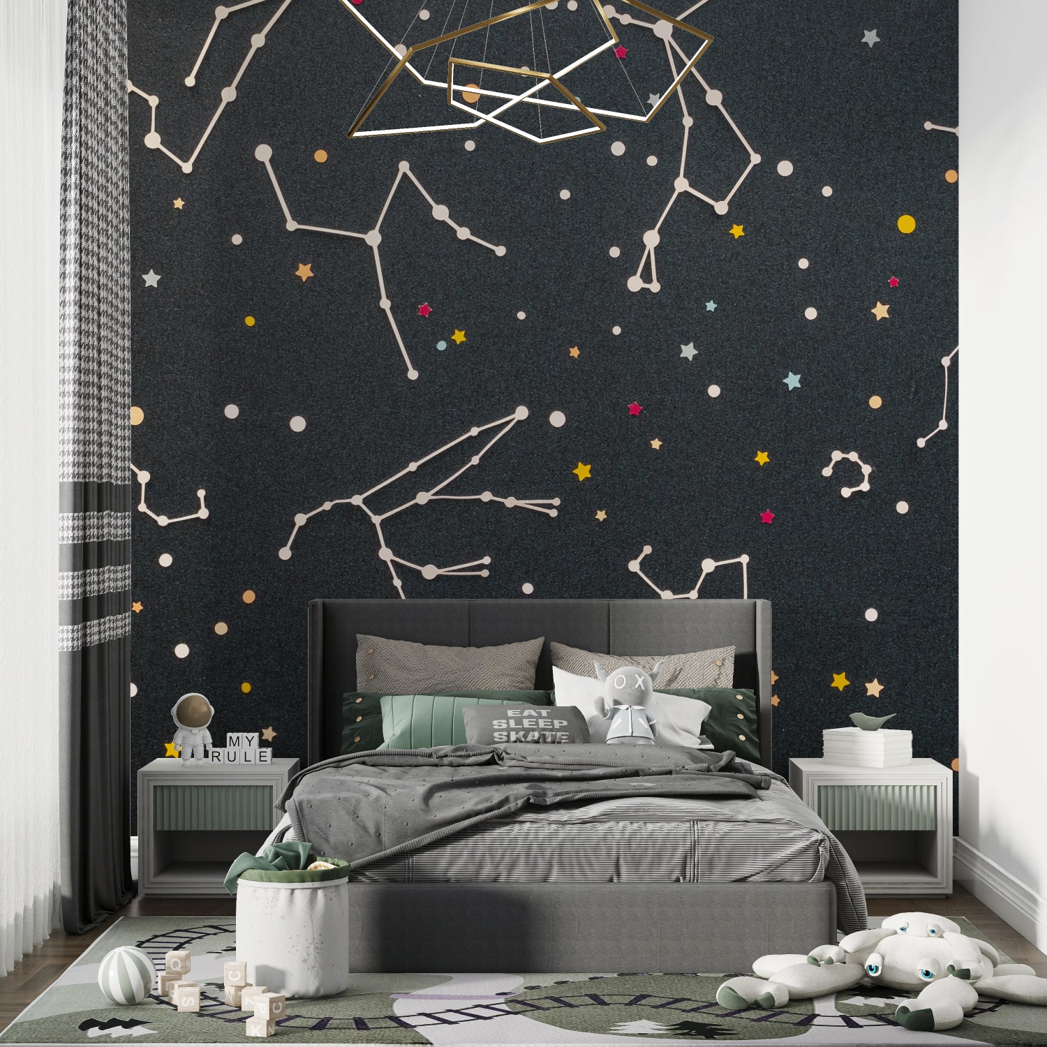 Playroom with celestial wall mural showing colorful star patterns and constellations