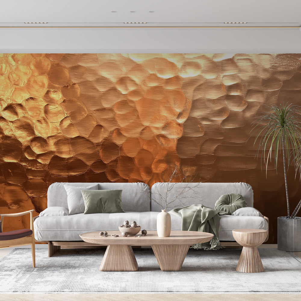 Copper 3D wall mural in modern living room showing dramatic light reflections on hammered metal pattern