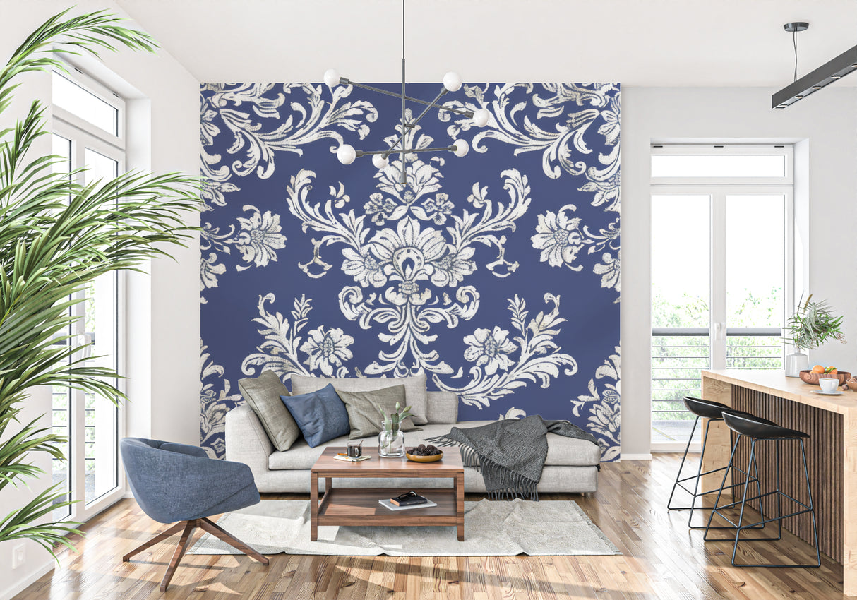 Blue damask wallpaper mural creating elegance in a modern living room with white furniture