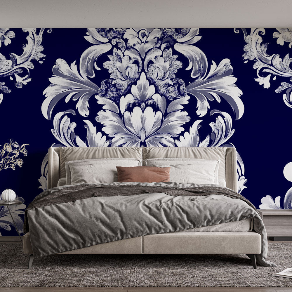 Blue and white damask wallpaper displayed in an elegant dining room with crystal chandelier and classic furniture