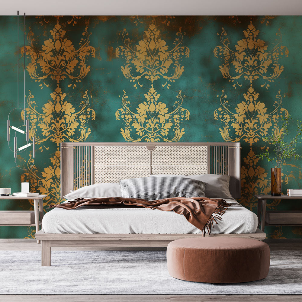 Gold and turquoise baroque wallpaper creating luxury atmosphere in modern dining room with crystal chandelier