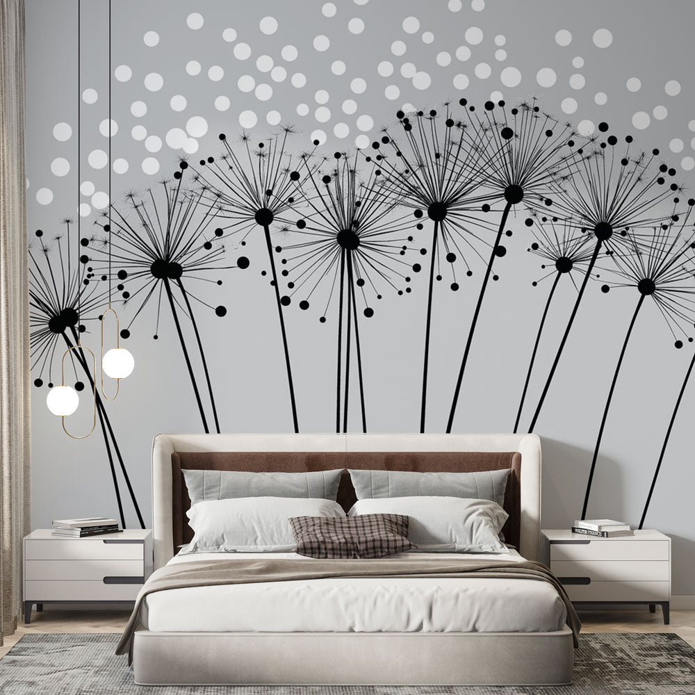 Modern black and white Dandelion Wallpaper creating depth in a minimalist living room with grey sofa and natural light