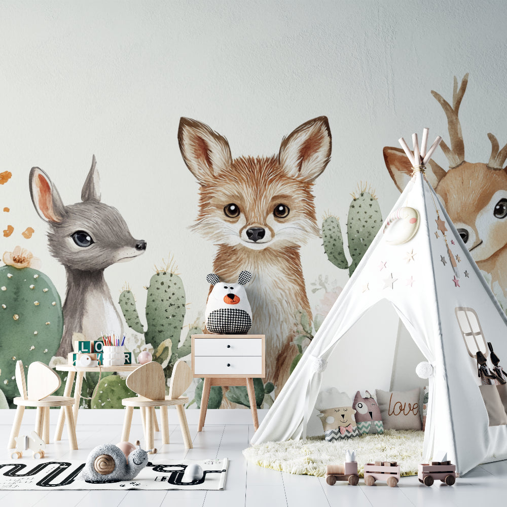 Desert mural wallpaper adding warmth to a toddler's bedroom