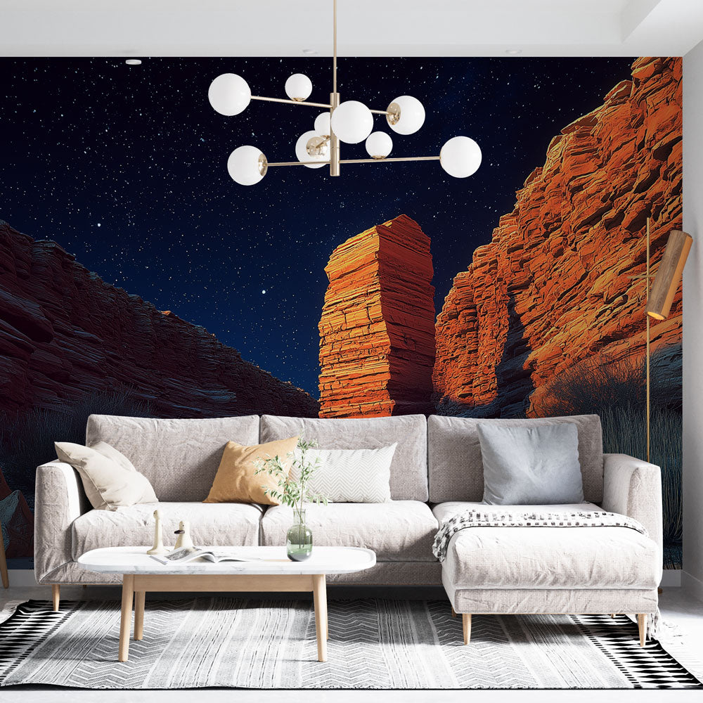 Desert canyon wallpaper creating dramatic atmosphere in modern living room with terracotta accents and mood lighting