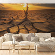 Desert landscape wallpaper creating a warm atmosphere in a modern living room with minimal furniture