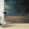Desert landscape wallpaper creating dramatic atmosphere in modern living room with minimal furniture