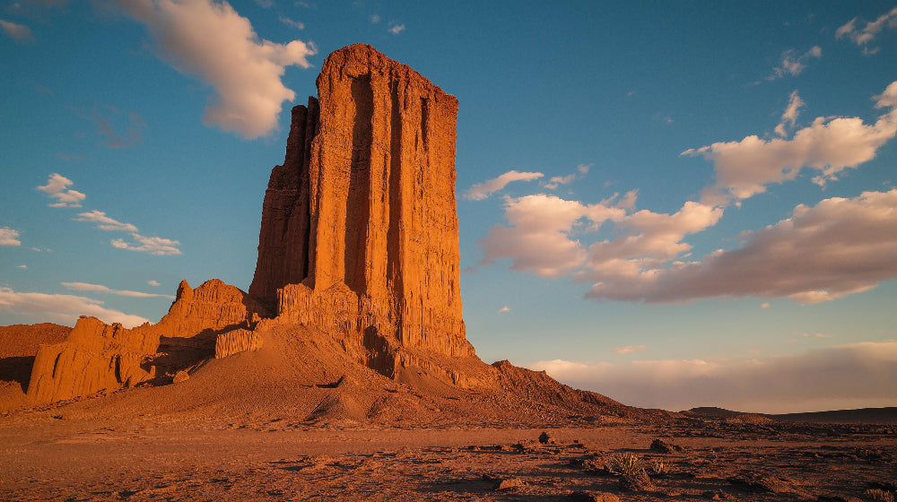 Desert mural wallpaper design file showing detailed terracotta monument against sunset sky