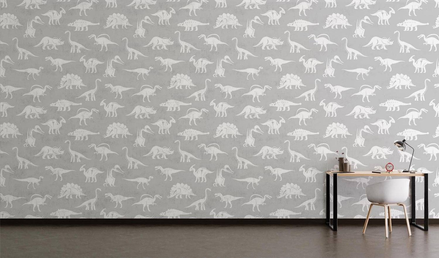 Grey and white dinosaur mural creating a fun learning space in a modern playroom setting