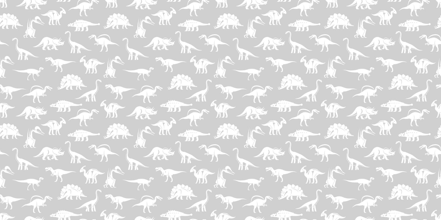 Design file of prehistoric silhouettes pattern on grey background with white dinosaur shapes