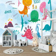 Dinosaur wallpaper mural bringing prehistoric fun to a bright, modern kids bedroom with colorful cartoon dinos