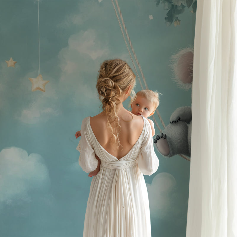 Nursery wall mural featuring swinging koala in a minimalist playroom