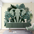 Elephant and monstera leaf wallpaper creating a peaceful atmosphere in a modern living room with natural light