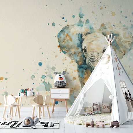Baby elephant watercolor wallpaper creating a soft, dreamy atmosphere in a modern nursery with white furniture